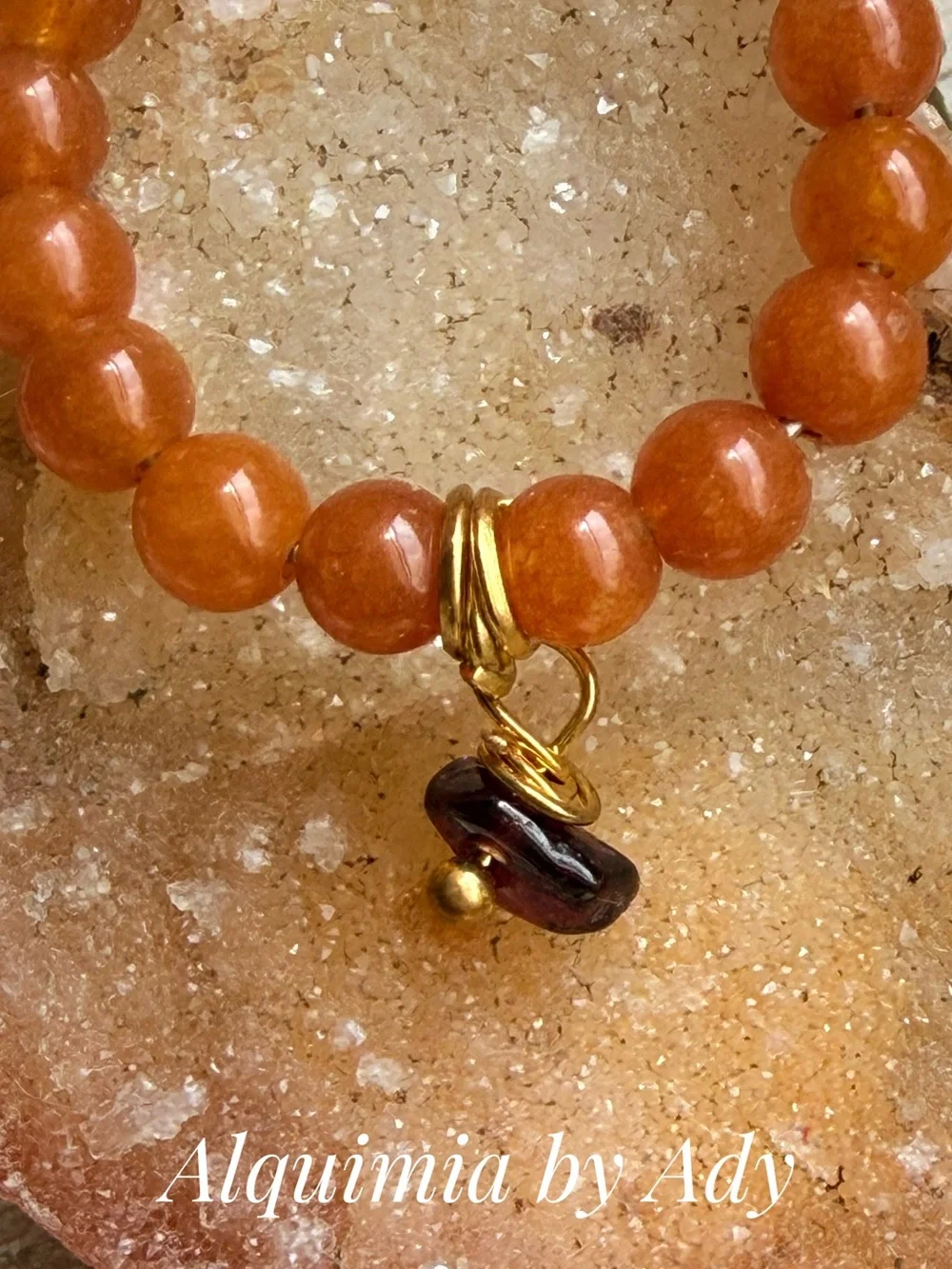 Orange carnelian Beaded Ring with Gold Accents and Dark garnet Charm